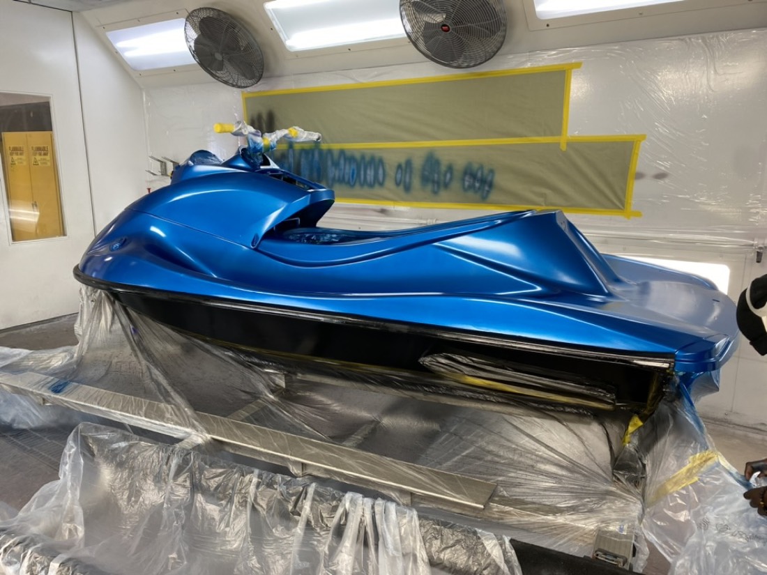 Custom-painted personal watercraft showing advanced refinish craftsmanship